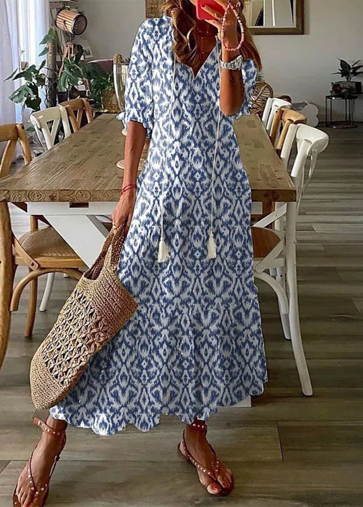 Sommerliches Maxikleid für Damen mit elegantem Blumenmuster, ideal für Strand und Freizeit.