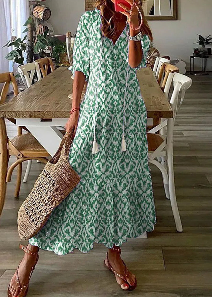 Luftiges Damen Maxikleid mit Kordelzug-Taille & Blumenmuster, ein sommerliches Urlaubsoutfit.