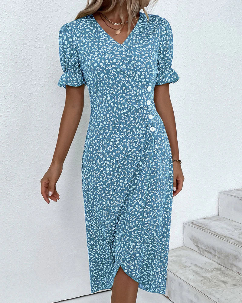 Schickes Damen Wickelkleid in Midi-Länge mit wunderschönem Blumenmuster. Ideal als Sommer- oder Partykleid.