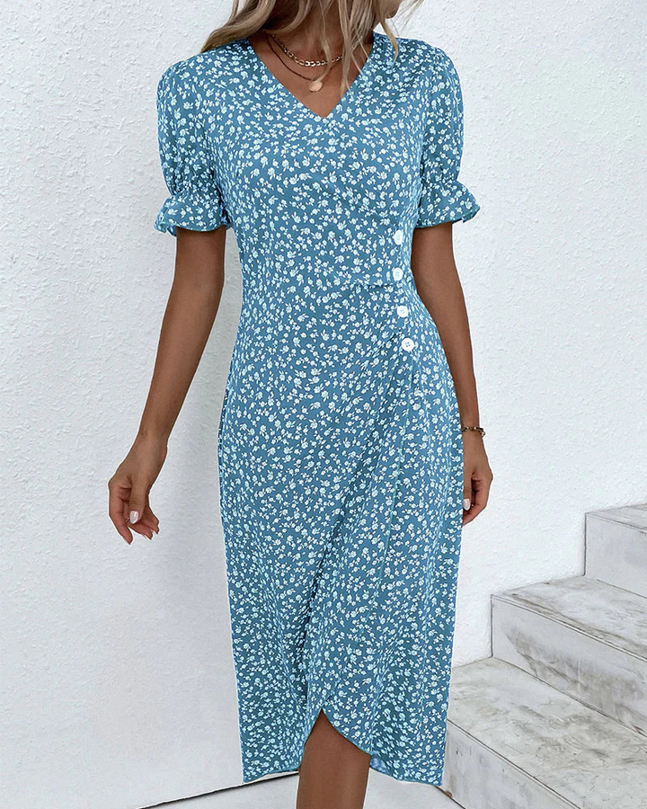 Schickes Damen Wickelkleid in Midi-Länge mit wunderschönem Blumenmuster. Ideal als Sommer- oder Partykleid.