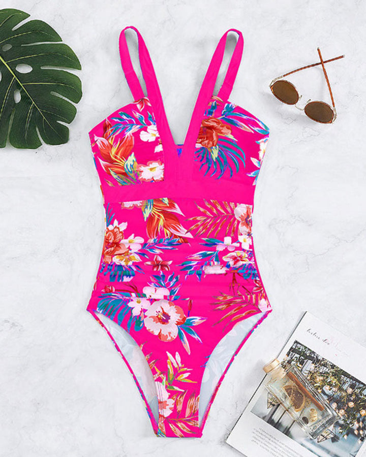 Vielseitiger einteiliger Damen Badeanzug, geblümt und mit Raffung, geeignet für Schwimmen, Sonnenbaden und Urlaub.