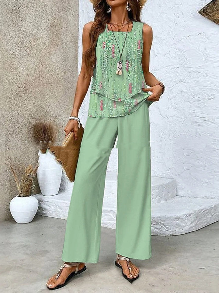 Elegantes Damen Sommeroutfit im Zweiteiler-Stil: luftige weite Hose & ärmelloses Top für urbane Looks.