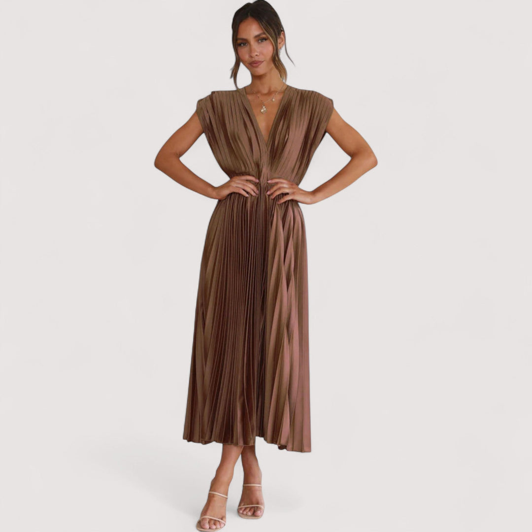 Fließendes Damenkleid, Plissee-Design, Kordelzug an der Taille, ideal für sommerliche Tage.