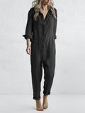 Eleganter schwarzer Langarm Jumpsuit für Damen, mit Knopfleiste & Taschen, vielseitig für Herbst-Outfits.