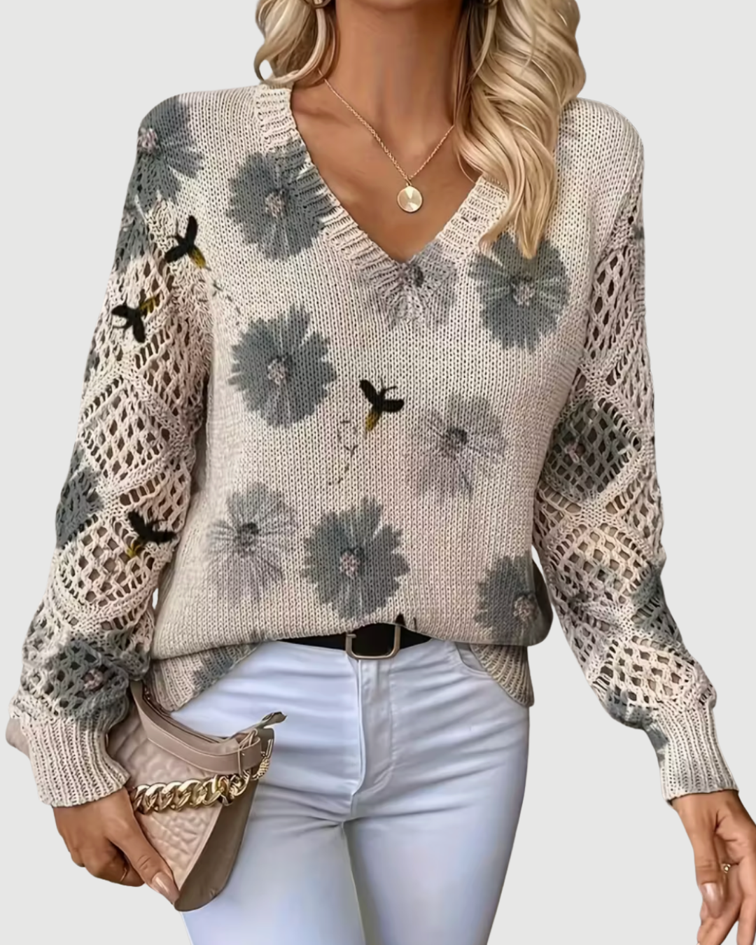 Modischer Damen Strickpullover, Langarm, mit weicher Oberfläche und durchbrochenen Ärmeldetails.