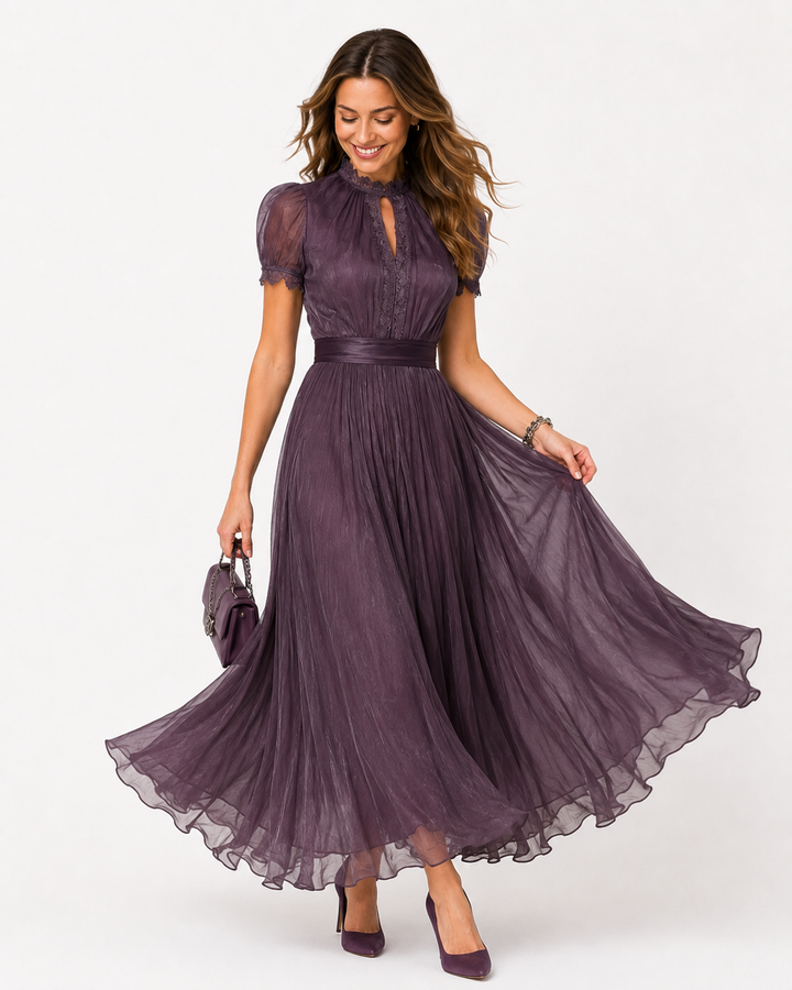 Elegantes lila Damen Partykleid mit O-Ausschnitt, ideal für Abend & besondere Anlässe. Feminine Mode in fließender Passform.