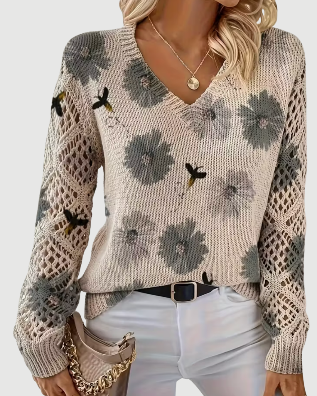 Weicher Damen Strickpullover mit durchbrochenen Ärmeln, perfekt für Eleganz & Komfort im Alltag.