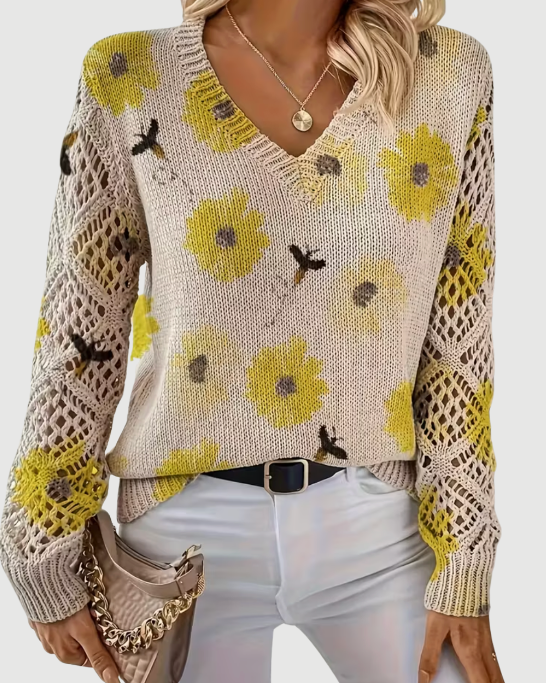 Damen Pullover mit besonderer Strickstruktur und durchbrochenen Ärmeln, ideal für Freizeit & Büro.