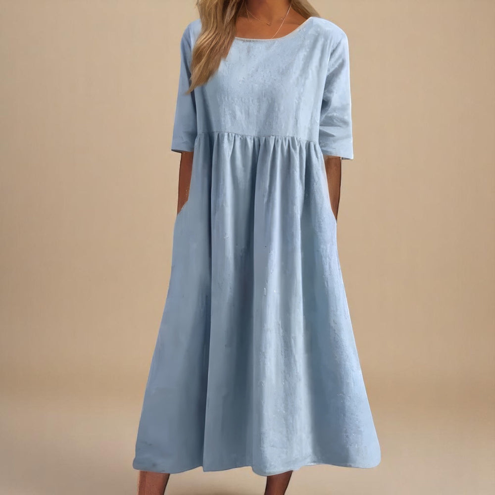 Lässiges Damen Midikleid mit Rundhals und praktischen Taschen, ideal als bequemes Sommerkleid.