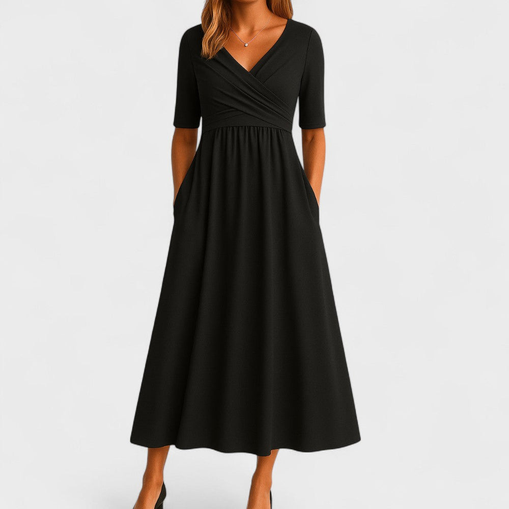 Stilvolles Damen Wickelkleid, knielang, mit femininem Wickelausschnitt. Ideal als bequemes Sommerkleid.