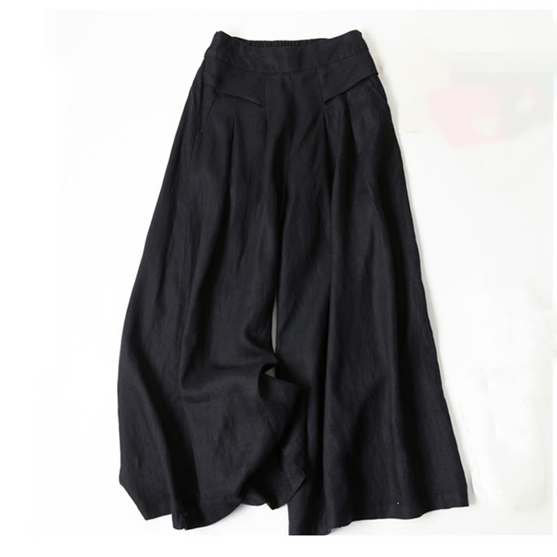 Vielseitige Damenhose mit weitem Bein, hoher Taille und bequemem Elastikbund. Lässige Eleganz für den Herbst.