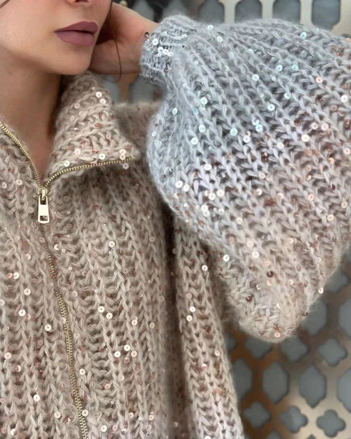 Weicher Damen Pullover mit Pailletten-Verzierung und tiefem V-Ausschnitt, ein glänzendes Highlight für jede Frau.