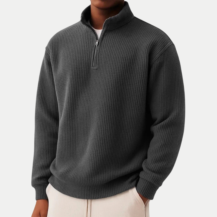 Herrenmode: Vielseitiger Pullover mit Reißverschluss, Stehkragen und Langarm-Design.