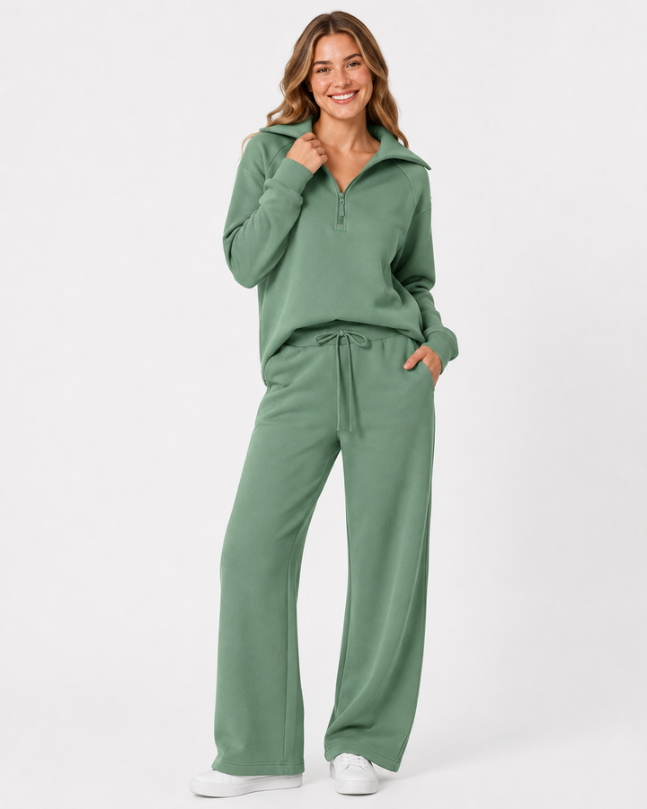Zweiteiliges Damen Outfit: Lockerer Sweatshirt und bequeme weite Hose. Perfekt für Zuhause oder unterwegs.
