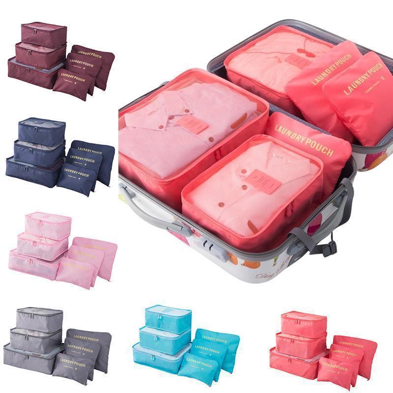 Ordnung im Koffer: Reise Organizer aus Mesh & Polyester für Kleidung, Schuhe & Toilettenartikel.