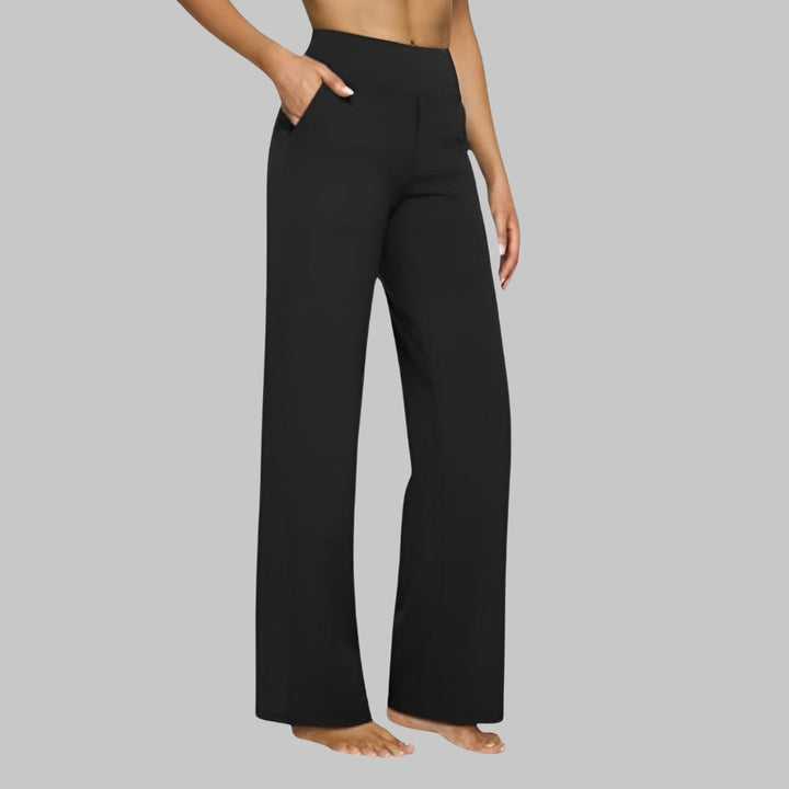 Schwarze Freizeithose für Damen, Stretch, hoher Bund, maximale Bewegungsfreiheit, vielseitig einsetzbar.