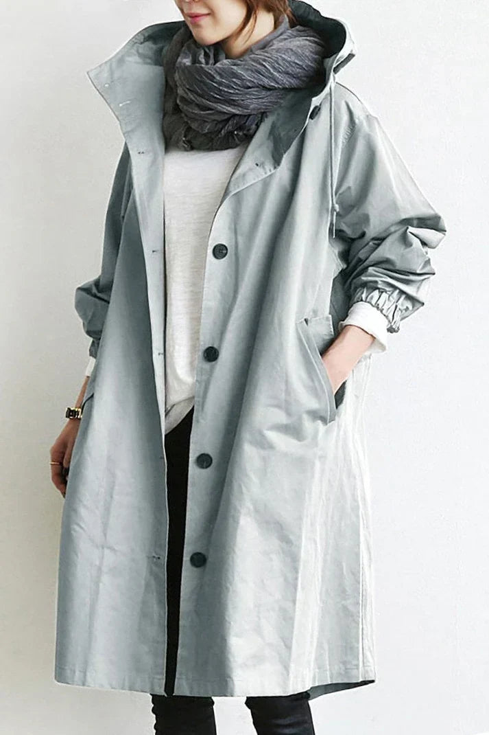 Eleganter wasserdichter Damen Trenchcoat mit Kapuze, idealer Wetterschutz und Übergangsjacke.
