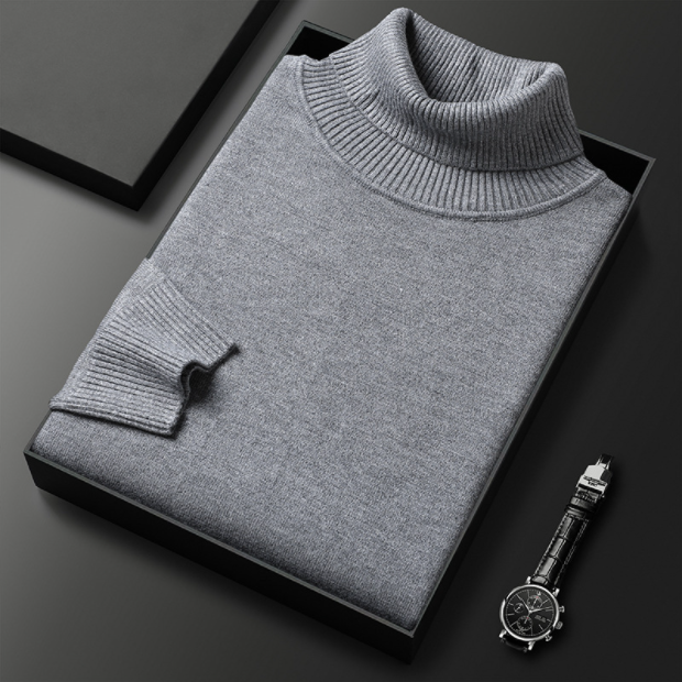 Nahaufnahme eines Herren Rollkragenpullovers aus feinem Strick, der Wärme & Komfort verspricht.