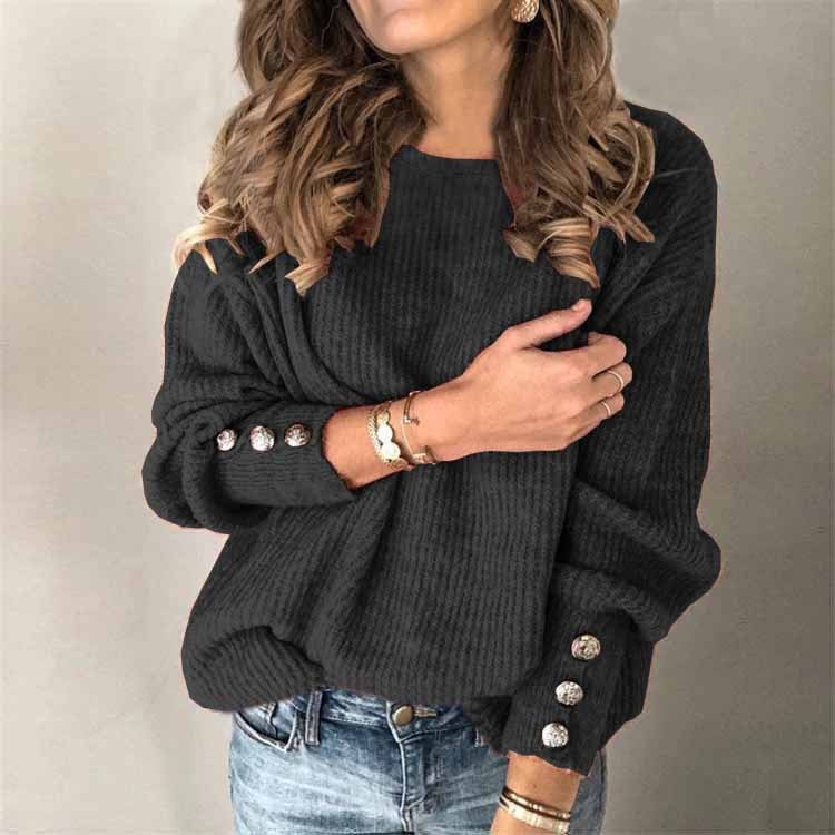Eleganter Damenpullover mit langen Ärmeln und dezenten Knopfdetails, ideal für den Winter.