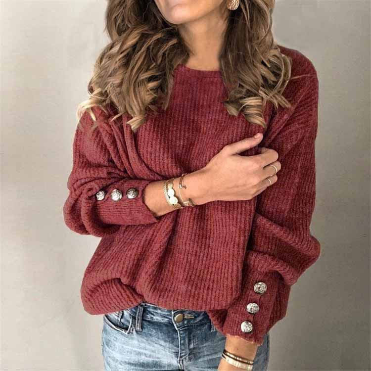Moderner Damen-Langarmpullover mit Knopfdetails an den Bündchen, elegantes Design.