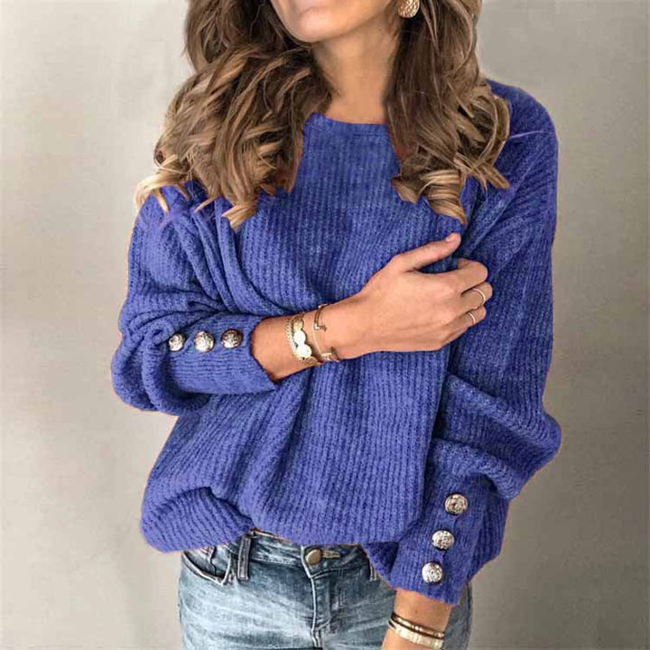 Vielseitiger Langarmpullover für Damen, mit eleganten Knopfdetails am Ärmel.