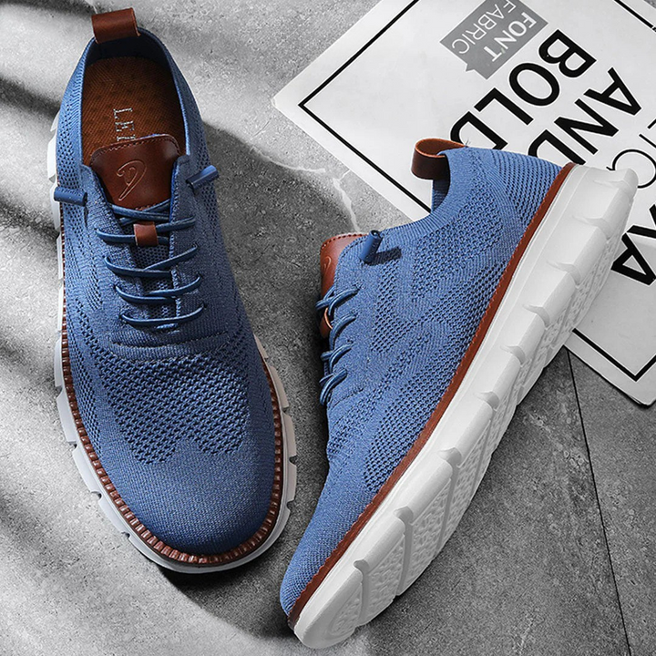 Seitenansicht der stilvollen Urban Herrenschuhe, betont das bequeme Hybrid-Design.