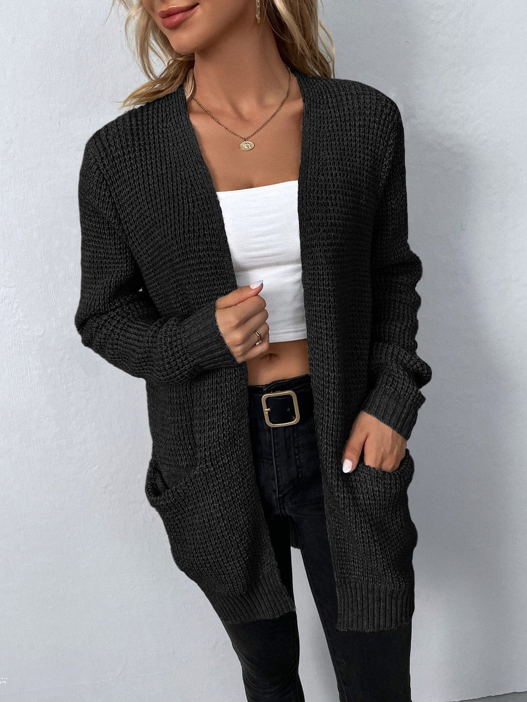Damen Strickjacke mit offenem Schnitt, ideal für einen lässigen, aber eleganten Layerlook. Hoher Tragekomfort.