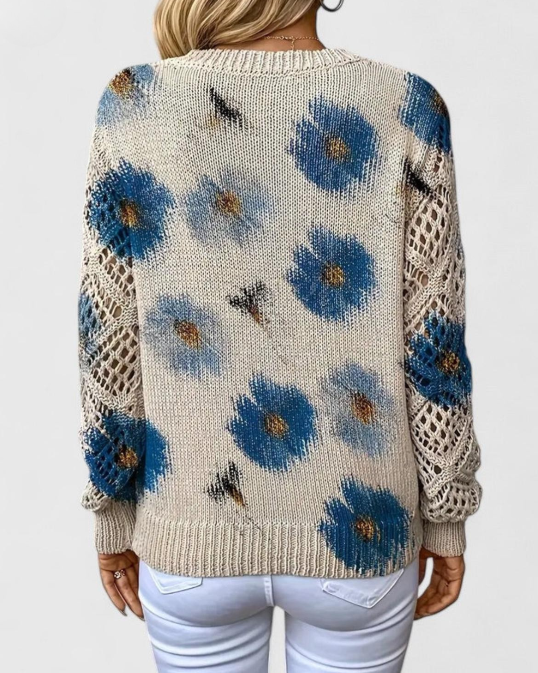 Komfortabler Damen Langarm-Pullover mit weicher Textur und modisch durchbrochenen Ärmeln.
