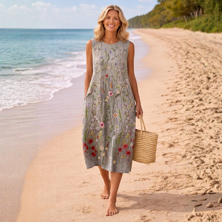 Elegantes graues Damen Midikleid mit Blumenmuster, tailliert, perfekt für Hochzeitsgäste und Sommerfeste.