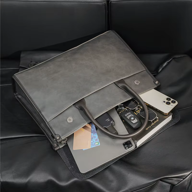 Professionelle graue Herren Aktentasche aus echtem Leder, ideal als Bürotasche und Pendlertasche.