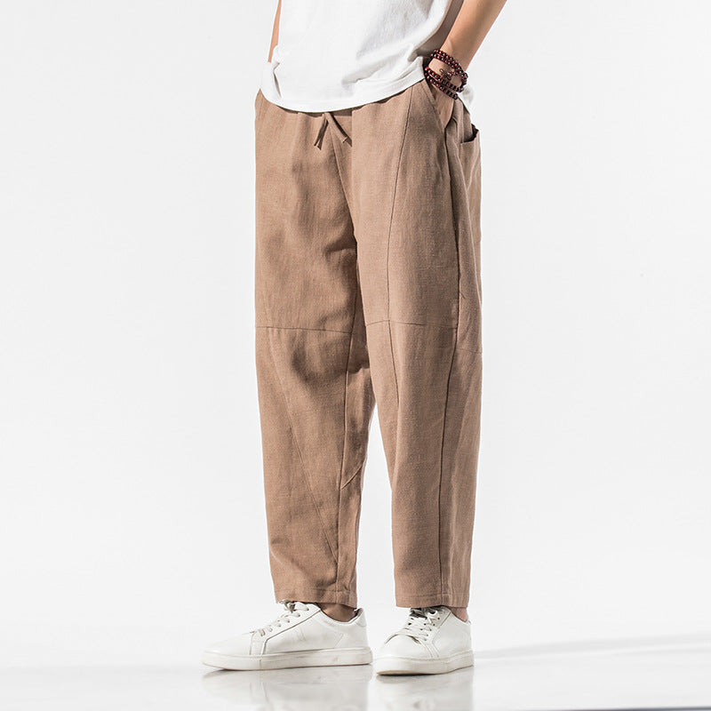 Trendige Herren Weitbein-Jogger, knöchellang mit Kordelzug, ideal für entspannte Freizeit-Looks.