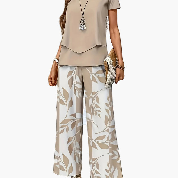 Elegantes Damen Sommerkleidungs-Set: Weite Hosen & Kurzarmshirt, ideal für Urlaub & gehobene Freizeit.