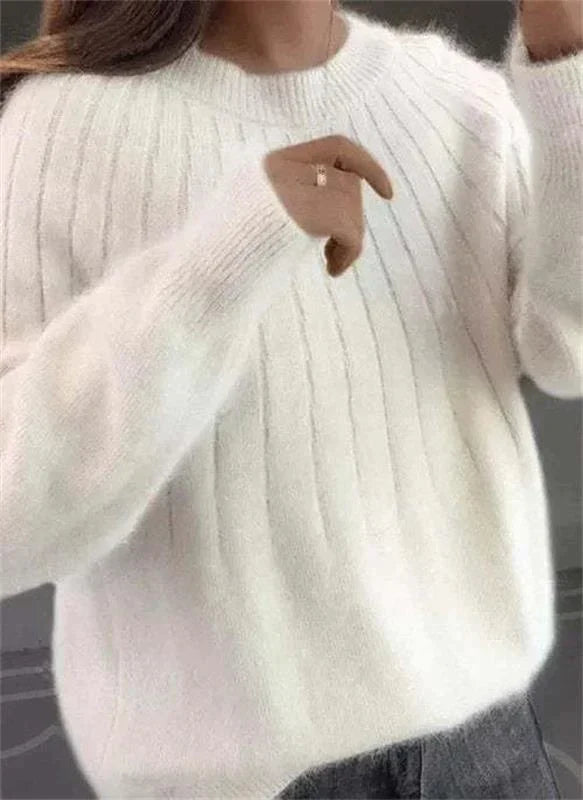 Eleganter Damen Winterpullover als Oberteil für stilvolle Herbstmode. Gemütlich und langärmelig.
