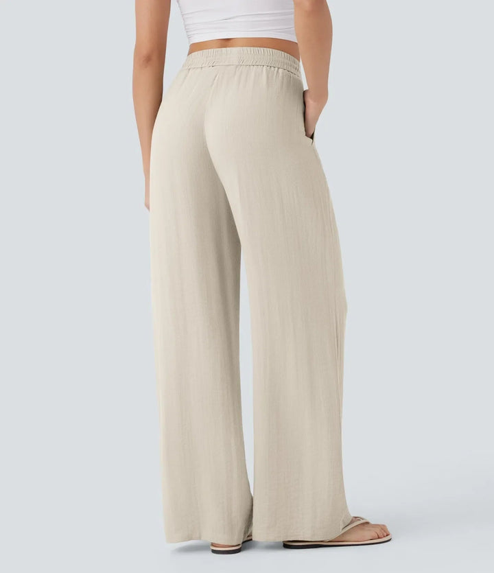 Graue elegante Sommerhose, weites Bein. Locker geschnitten, perfekt für luftige Outfits.