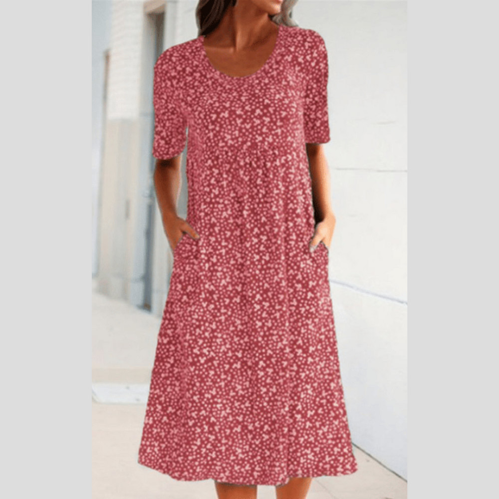 Elegantes Damen Midikleid Sonnentanz mit floralem Muster, schmeichelhafter A-Linie und hohem Tragekomfort.
