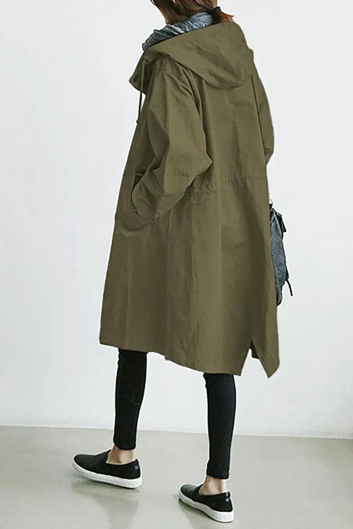 Vielseitiger Damen Trenchcoat, wasserdicht mit Kapuze, perfekt als elegante Übergangs- oder Freizeitjacke.