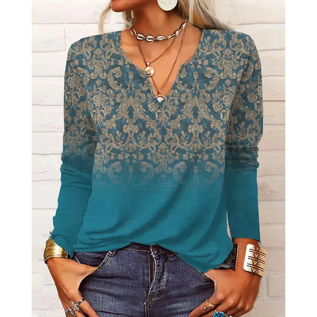 Elegante Damen Bluse im Boho-Stil mit buntem Blumenmuster. Lockere Passform, Langarm & V-Ausschnitt für Frühling.