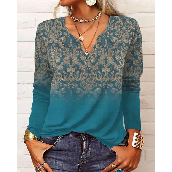 Elegante Damen Bluse im Boho-Stil mit buntem Blumenmuster. Lockere Passform, Langarm & V-Ausschnitt für Frühling.