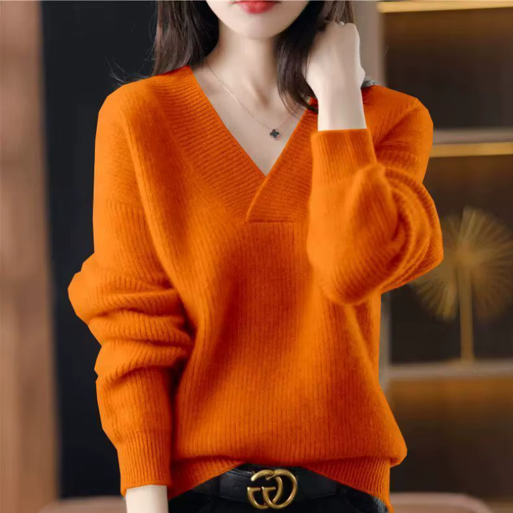 Damenmode: Rippstrickpullover mit V-Ausschnitt, lockerer Passform. Trendiger Pullover für alle Jahreszeiten.