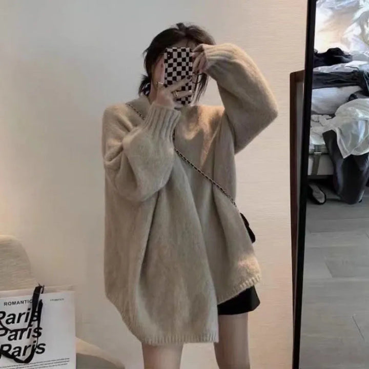 Kuschelige Damen Strickjacke mit weitem Schnitt & Knopfleiste. Perfekter Cardigan für kalte Tage.