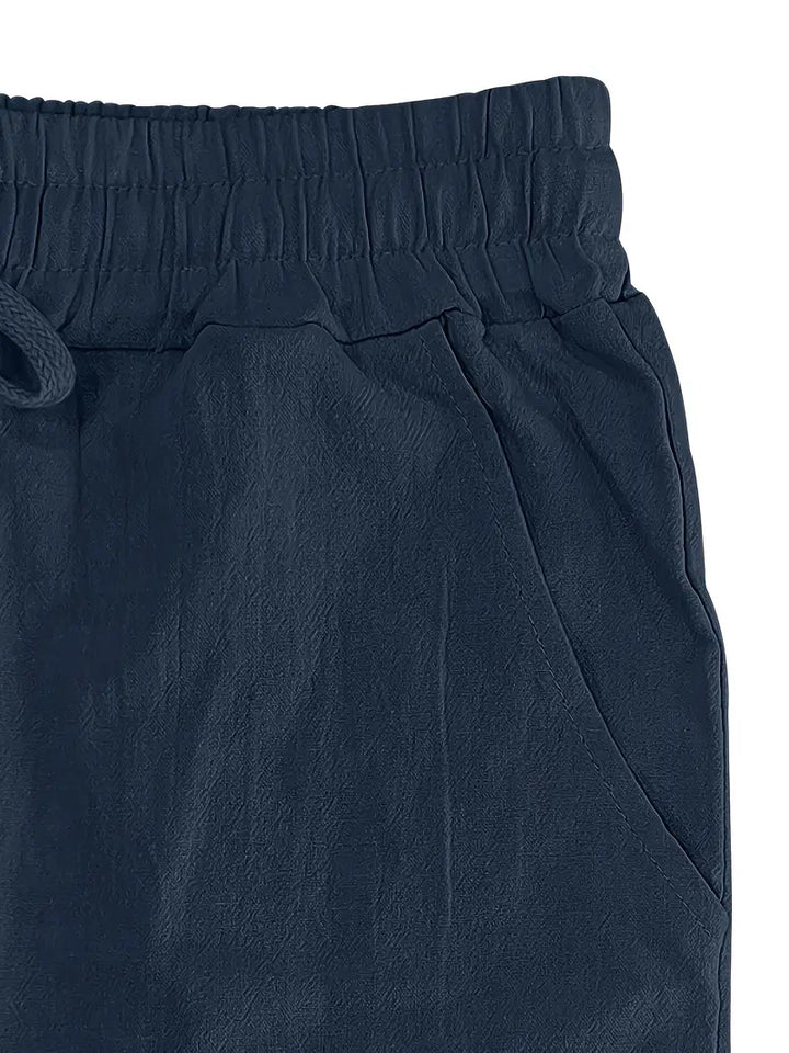 Herren Freizeithose, weiß, locker & komfortabel. Für Mode & Urlaub am Strand.