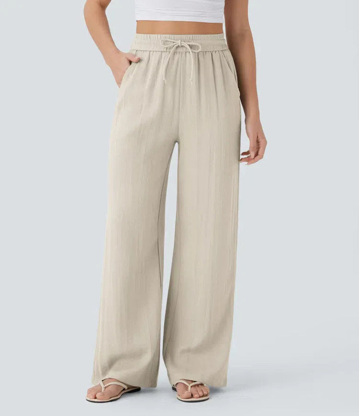 Elegante Damen Sommerhose mit weitem Bein in Beige. Perfekt für luftige Casual-Looks & Urlaub.