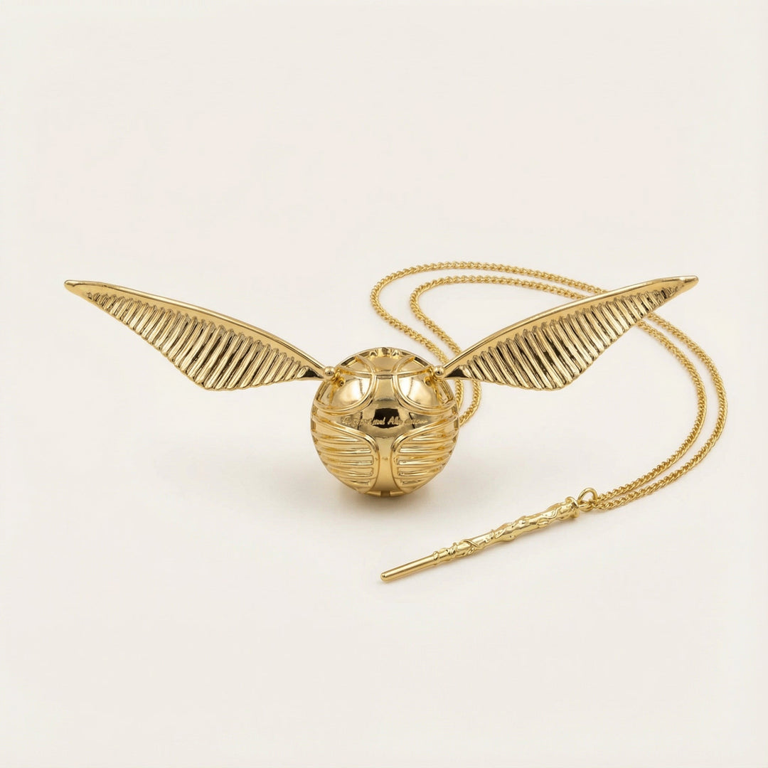 Elegante goldfarbene Ringbox mit Flügelmechanik für Verlobung & Hochzeit.