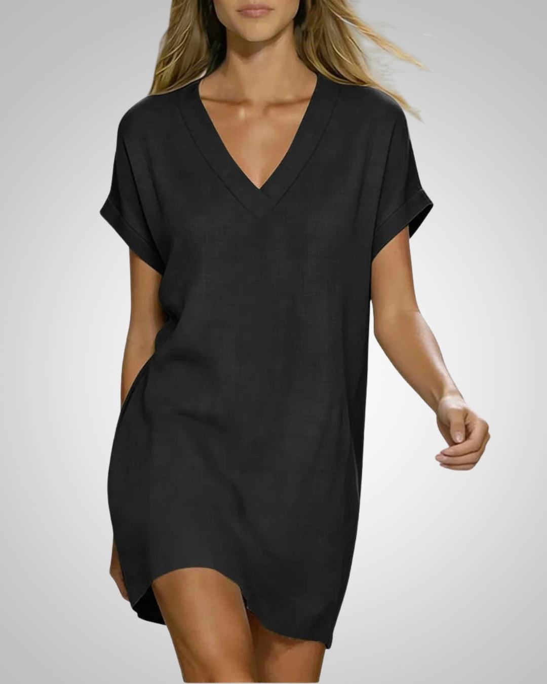 Lockeres Damen Midikleid mit V-Ausschnitt und Kurzarm. Bequemes Alltags- und Freizeitkleid für Damen.