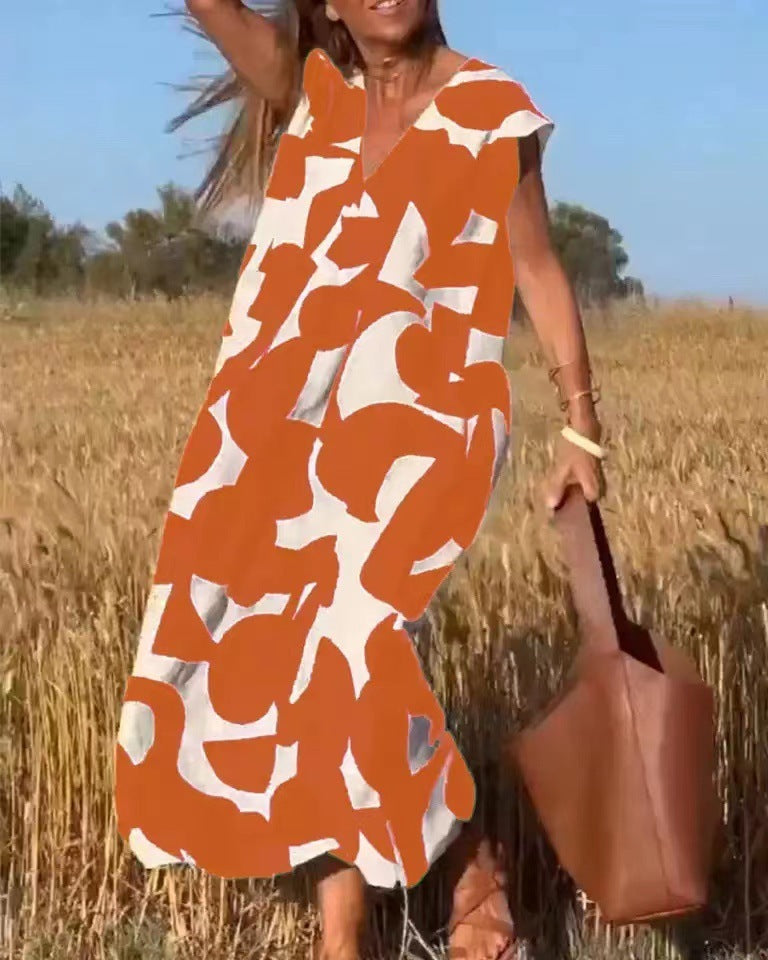Elegantes Damen V-Ausschnitt Maxikleid, bedruckt und fließend fallend, perfekt als luftiges Sommer- oder Strandkleid.