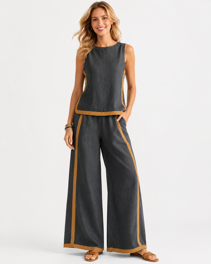 Trendy Damen Sommer Outfit: ärmelloses Top und weite Langhose, locker und bequem für warme Tage.