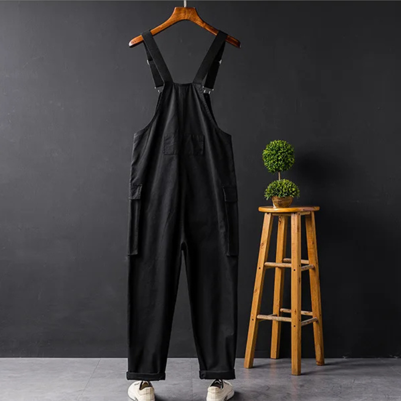Orange Unisex Latzhose, perfekt für Outdoor-Freizeit im Herbst. Bequemer Baumwoll-Overall mit lockerer Passform.