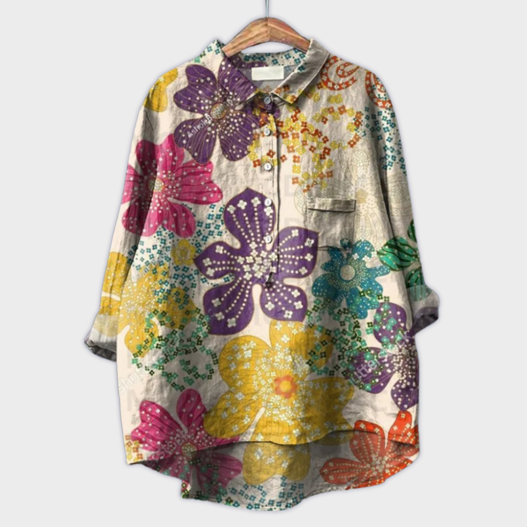 Lockere Tunikabluse für Frauen mit lebhaftem Blüten-Design, ideal für den Sommer.
