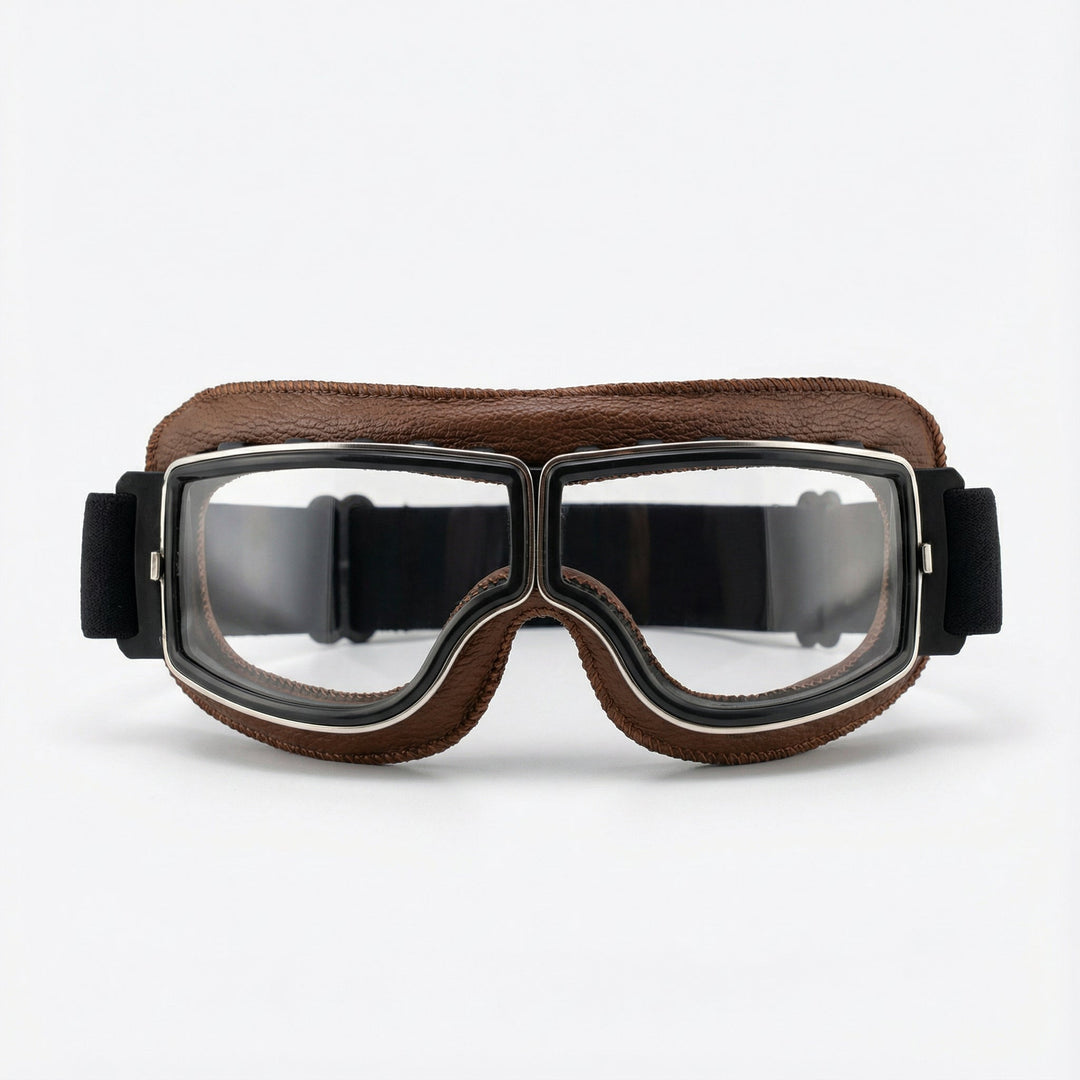 Vintage Motorradbrille aus braunem Leder mit klarem Glas, ideal für stilvolle Retro-Motorradfahrten & Schutz.