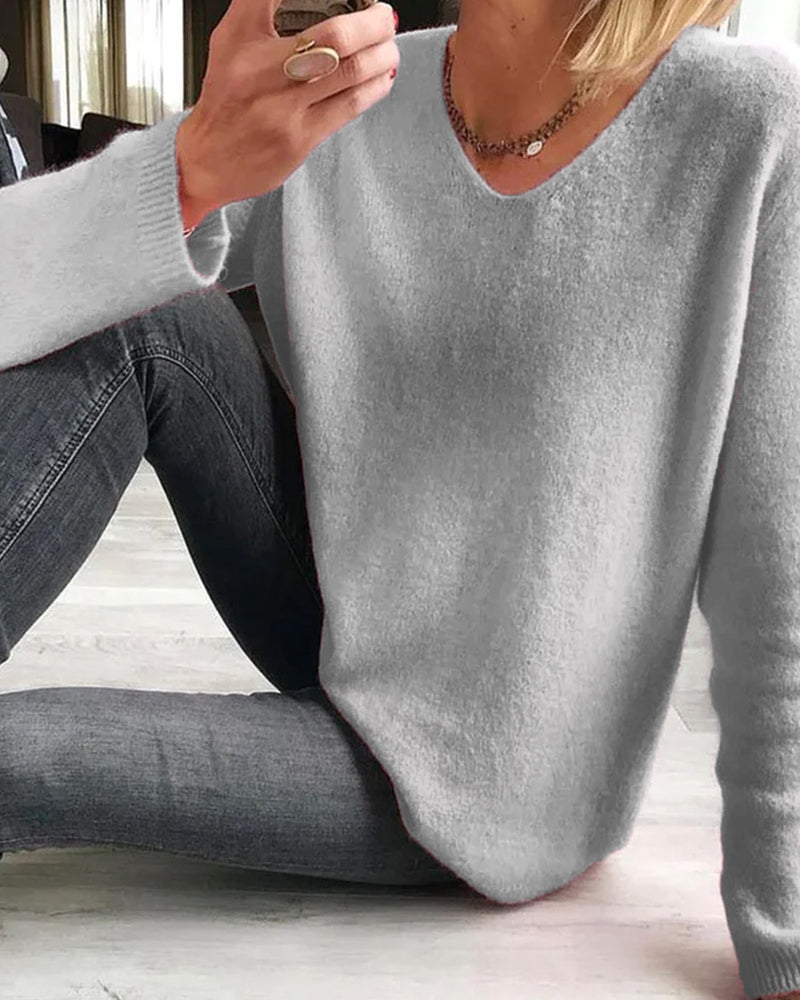Bequemer rosa Damen-Langarmpullover mit V-Ausschnitt. Ideal für Herbst/Winter Casual Mode.